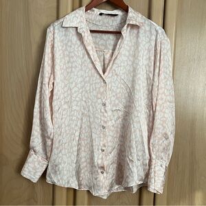 Woman’s Zara pink leopard print satin blouse